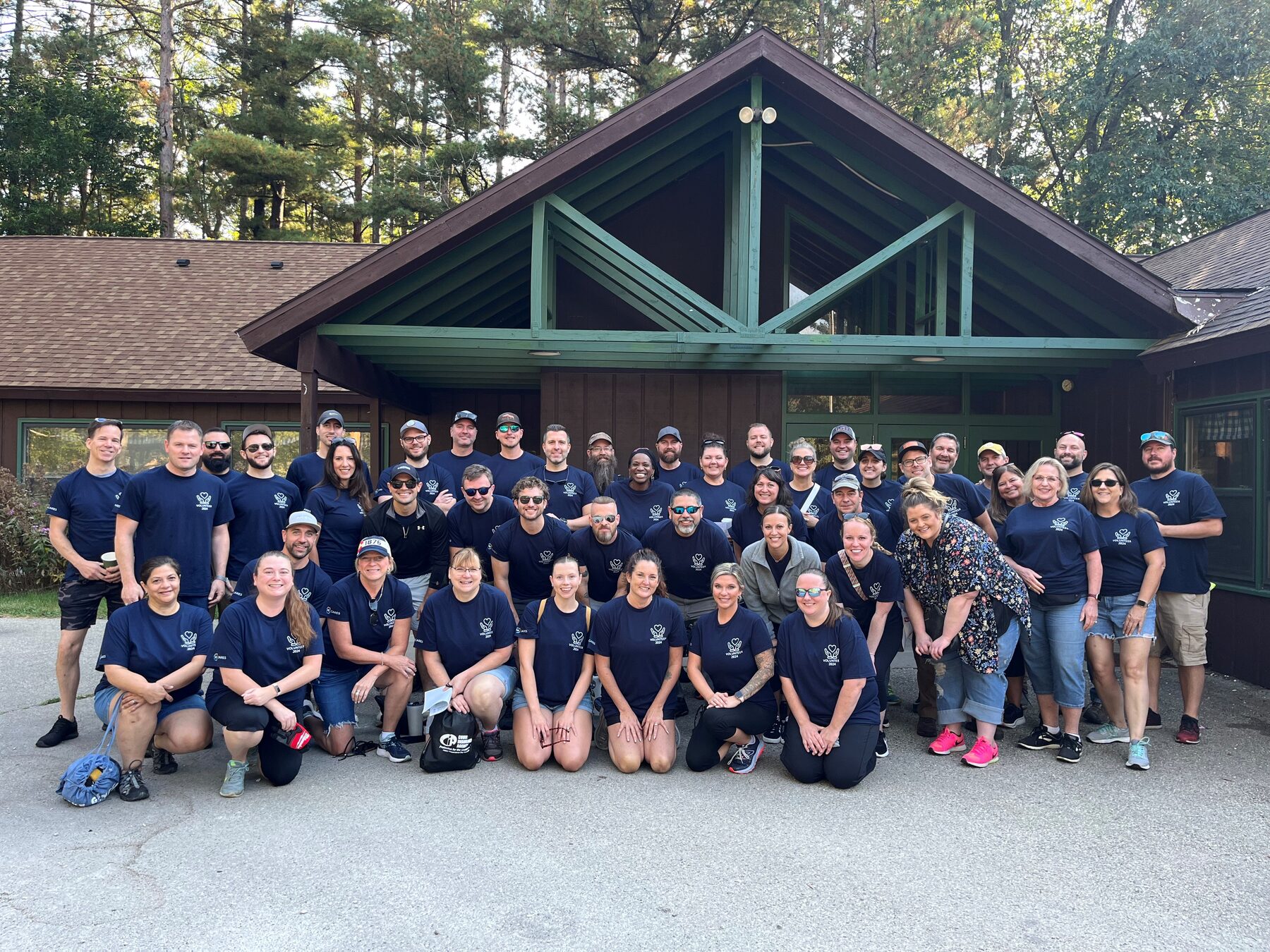 AE Business Solutions employees volunteering together on an AE Cares Day.